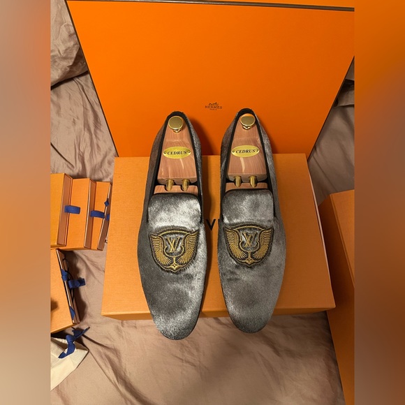 Louis Vuitton men’s Silver Pony hair loafers.